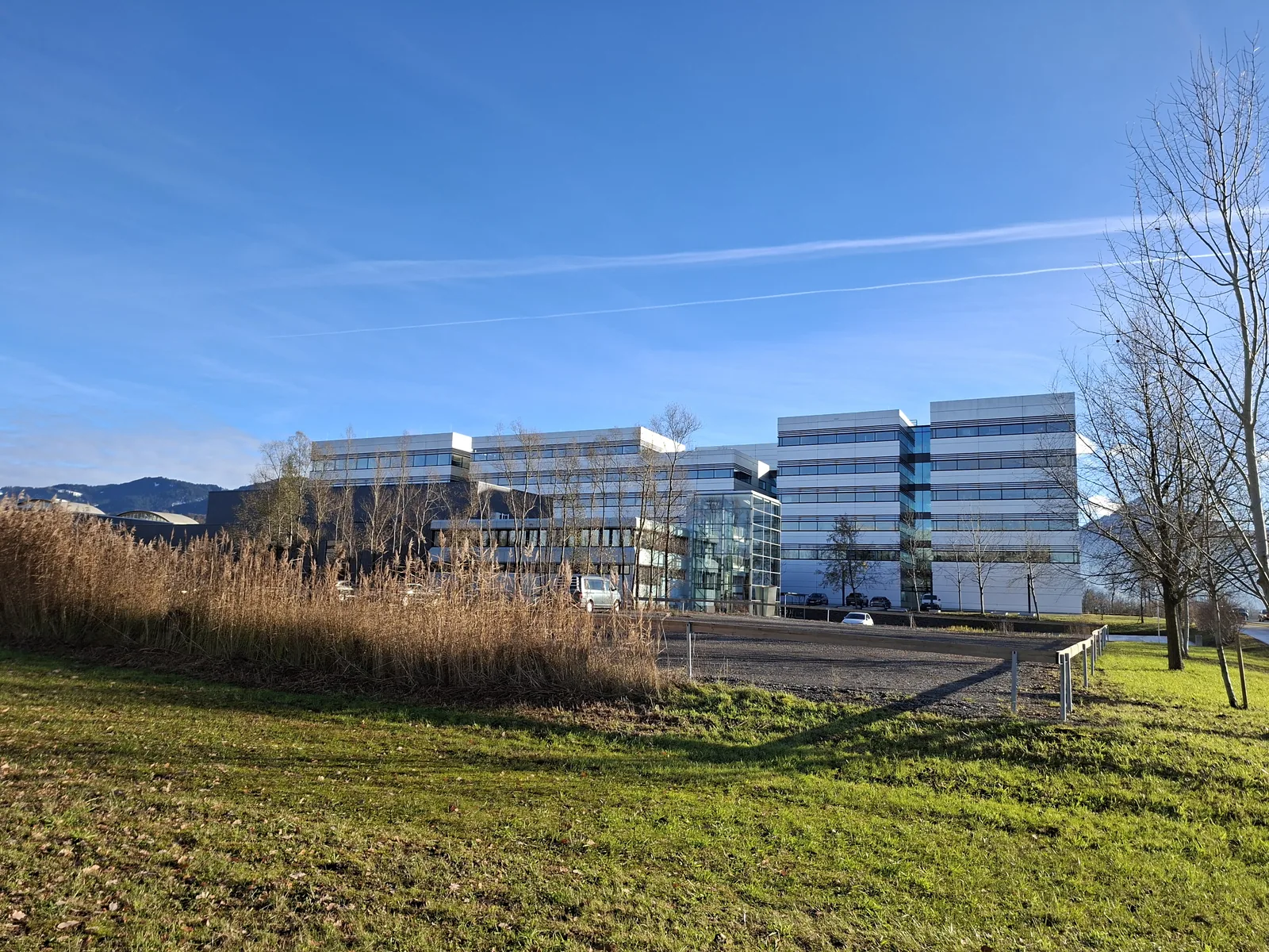 Architecturally distinctive multi-storey steel and glass corporate office building of ropeway manufacturer Doppelmayr in Wolfurt.