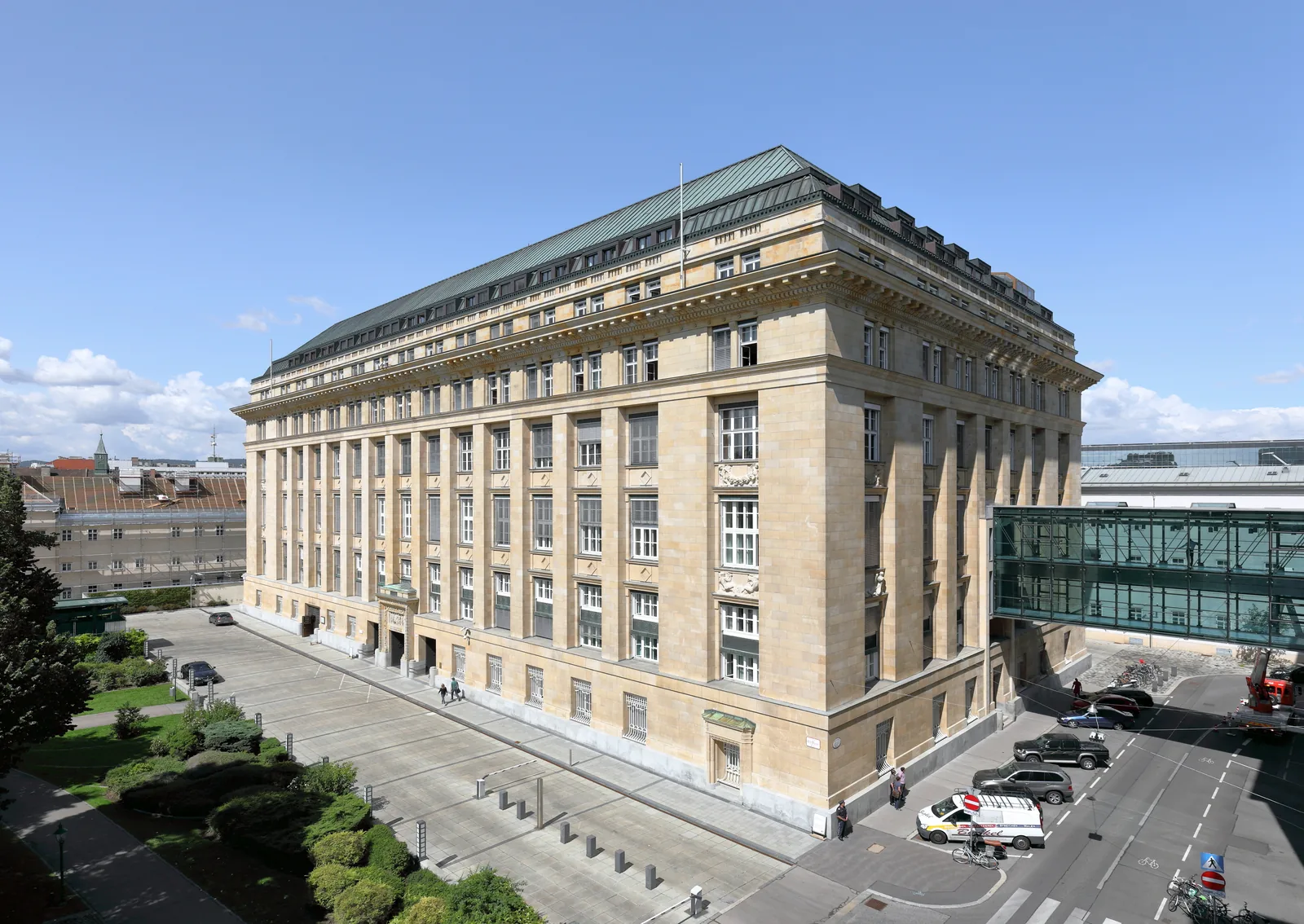 Monumental neoclassical stone facade and entrance of the Austrian Central Bank headquarters in Vienna.
