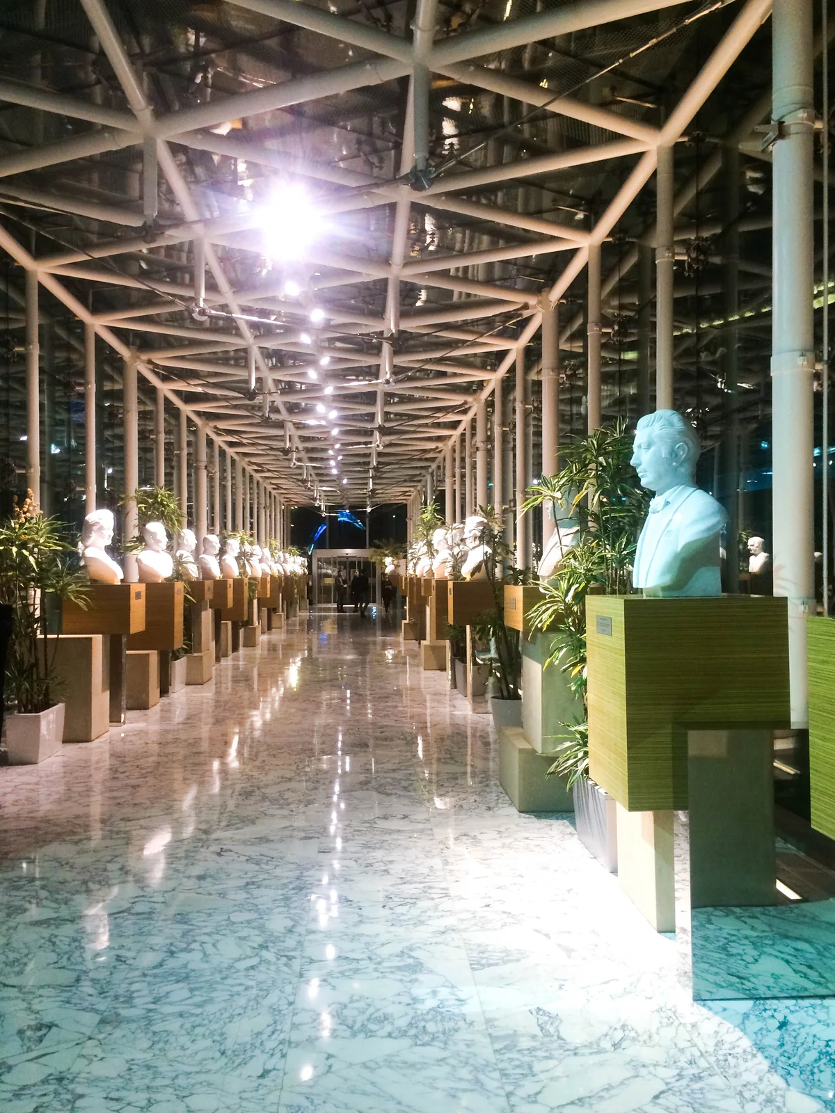 Exhibition hall lined with sculpted bronze busts of prominent historical Azerbaijani musicians and singers.