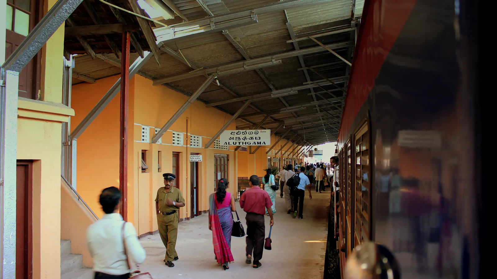 A modern Class S11 diesel multiple unit train on the platform at Colombo Fort Station.