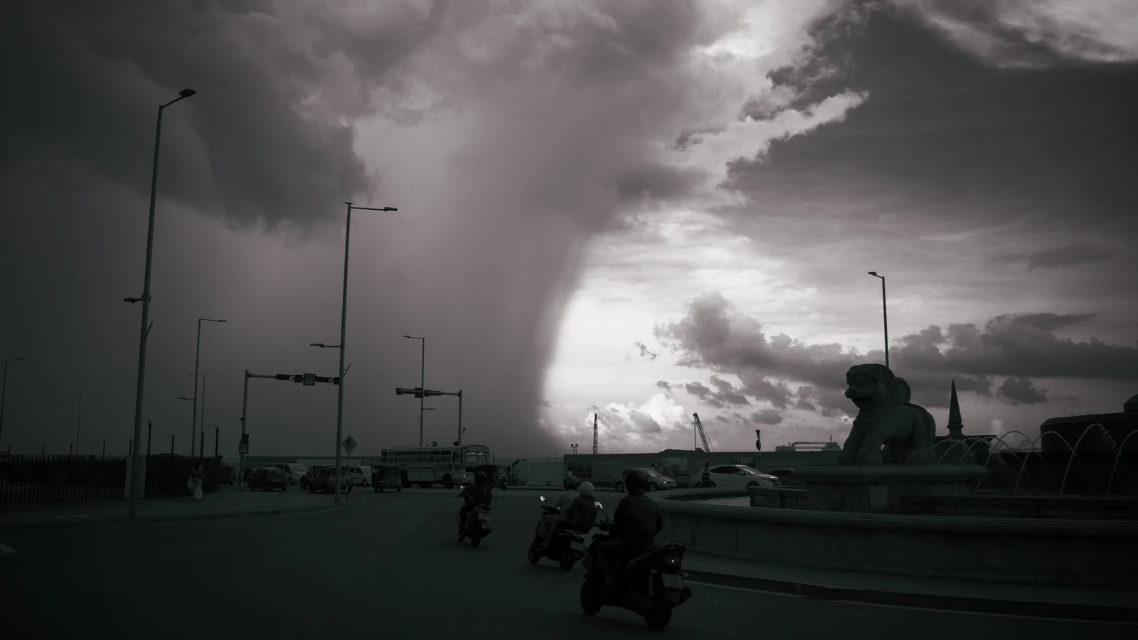 A dark southwest monsoon storm front advancing over the coastal skyline of Colombo.