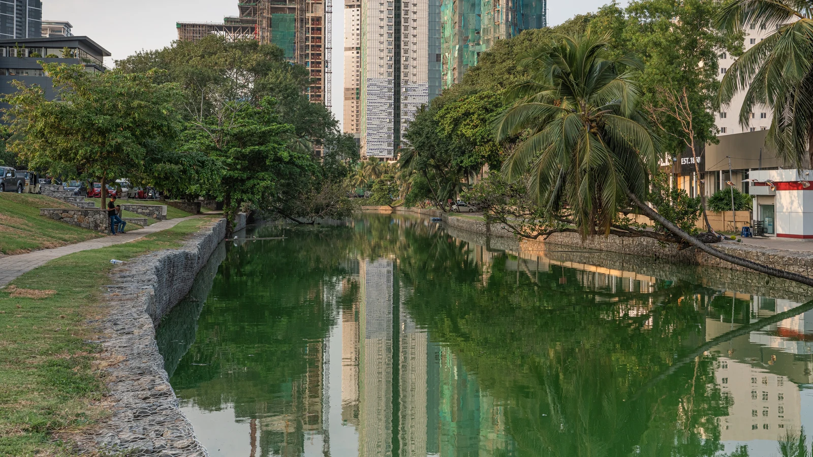 An urban drainage canal regulating water levels and releasing runoff into the sea in Colombo.