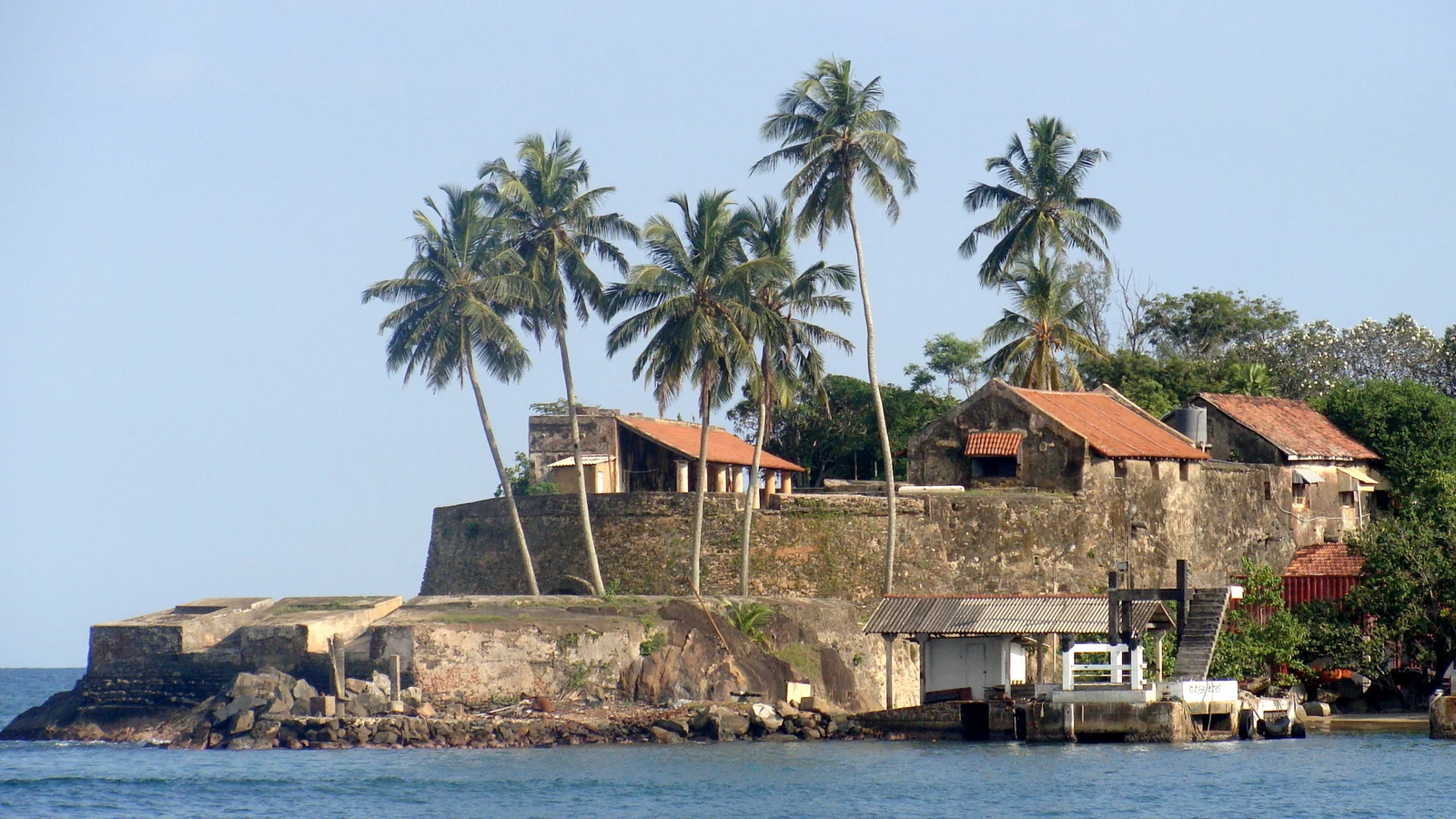 Ancient stone masonry and defensive cannon embrasures of Zwart Bastion in Galle Fort.