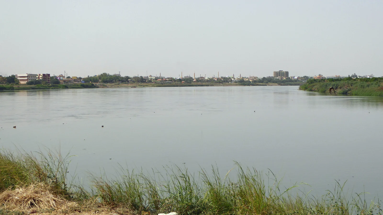 The Blue Nile riverfront and urban skyline in Khartoum.