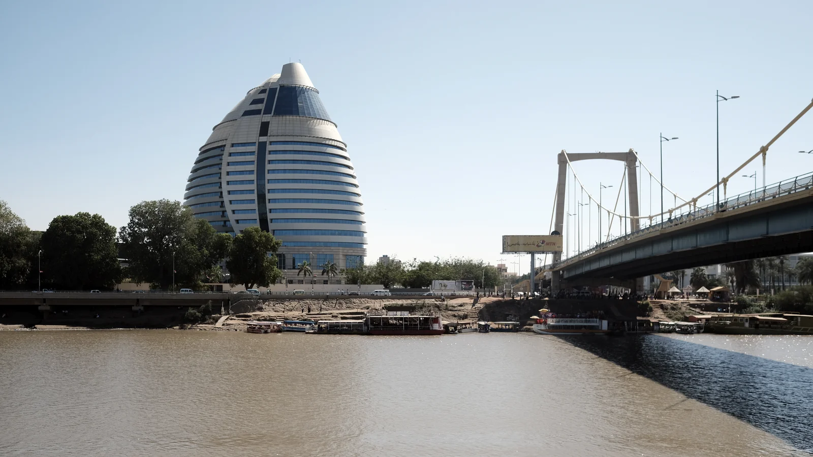 The modern suspension bridge connecting Khartoum and Tuti Island across the Blue Nile.