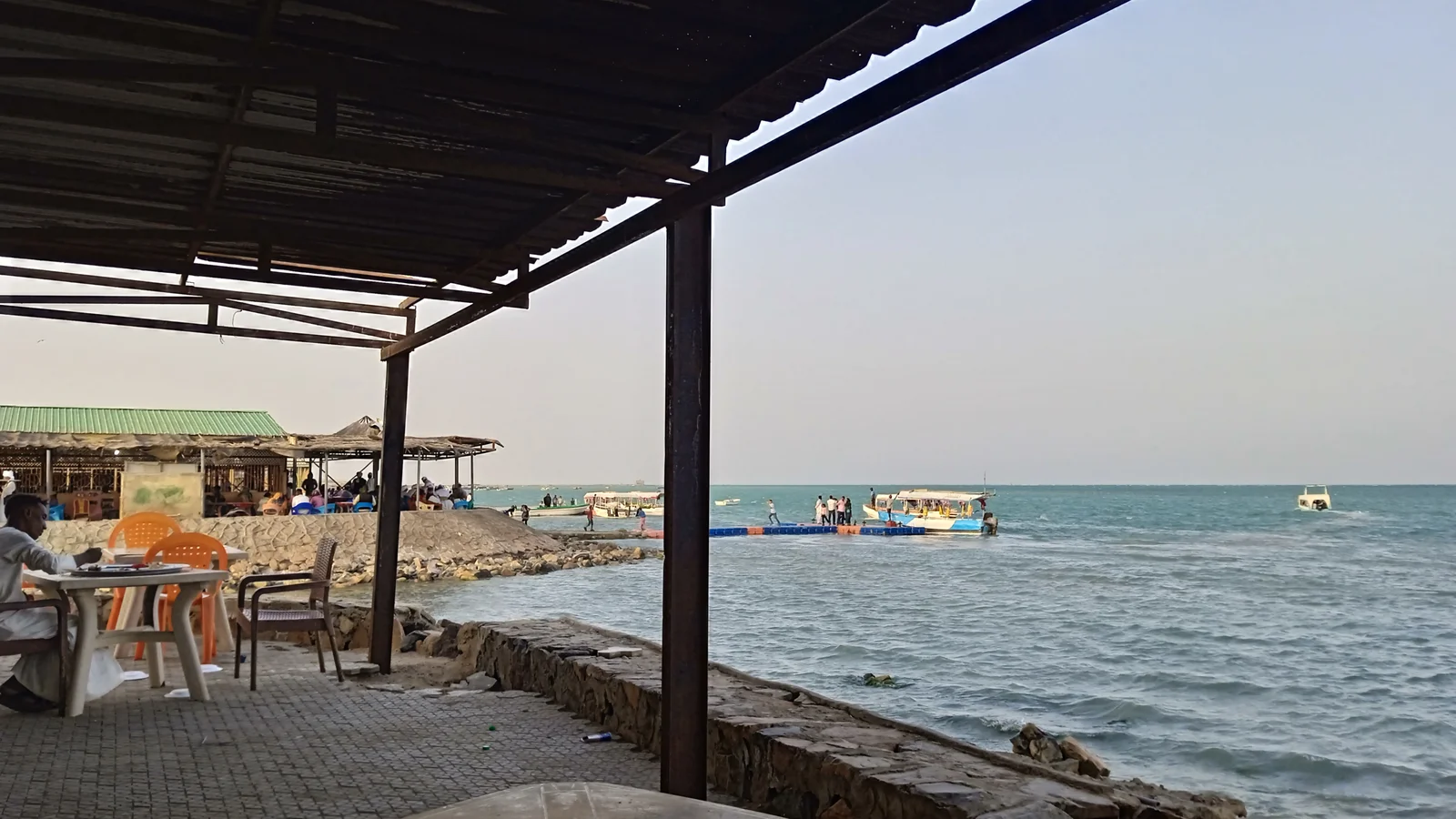 The open-air coastal dining promenade and fish pavilions at Al-Sigala in Port Sudan.
