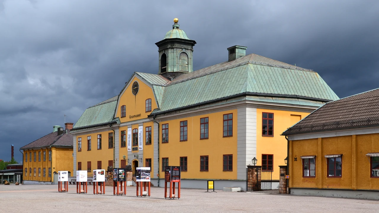 Historic wooden mining administrative building in Falun painted in traditional Falu red pigment.