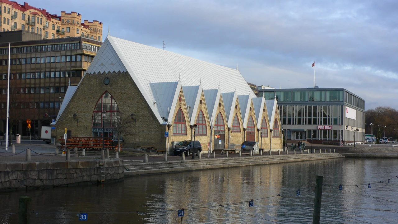 Waterfront view of Feskekôrka from the opposite quay of Rosenlund Canal in central Gothenburg.