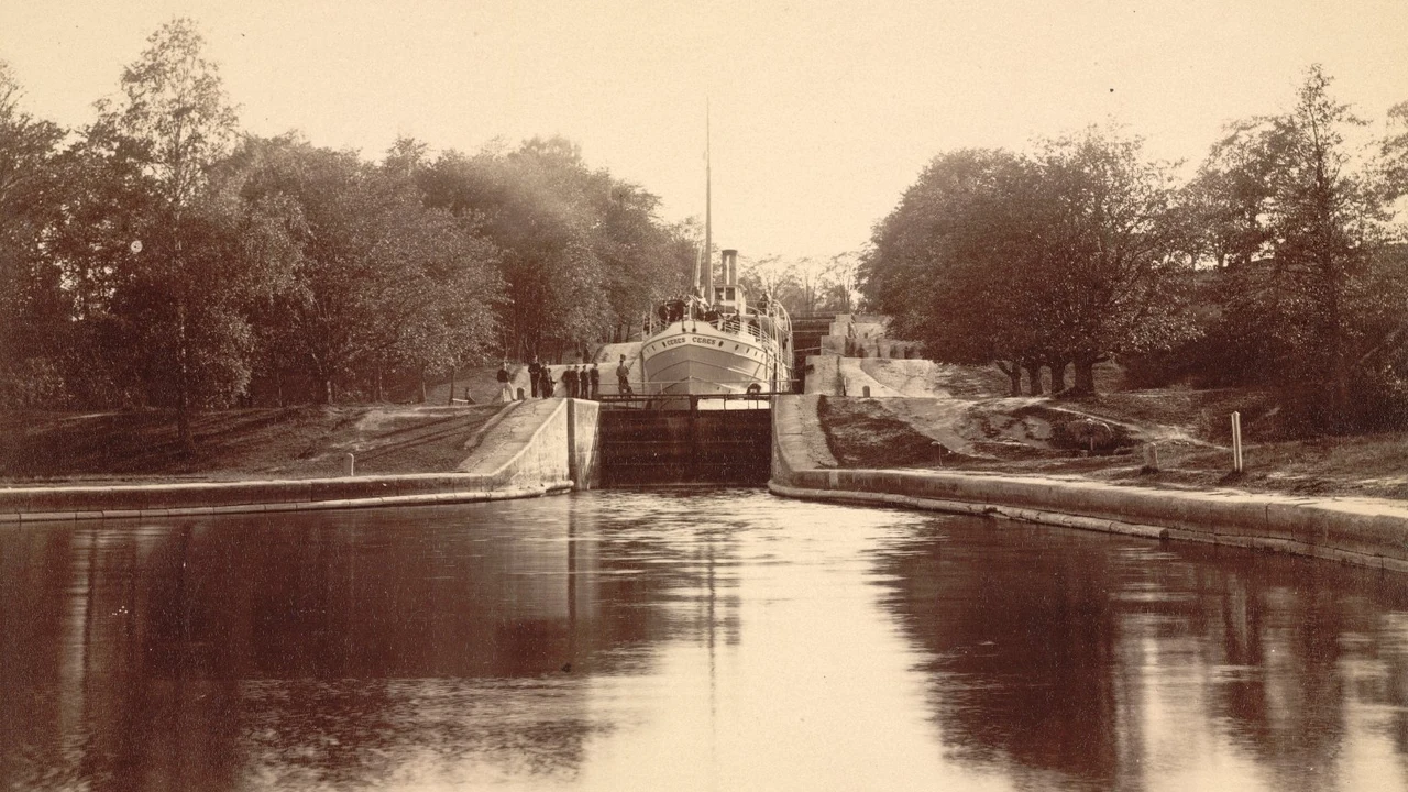 Vessels navigating the tiered lock chambers of the Borenshult lock flight on the Gota Canal.