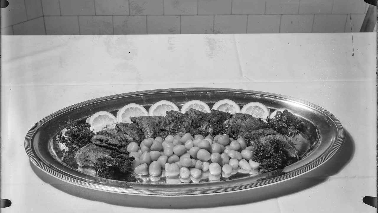 Traditional Swedish smörgåsbord festive cold buffet arrangement documented in historical museum records.